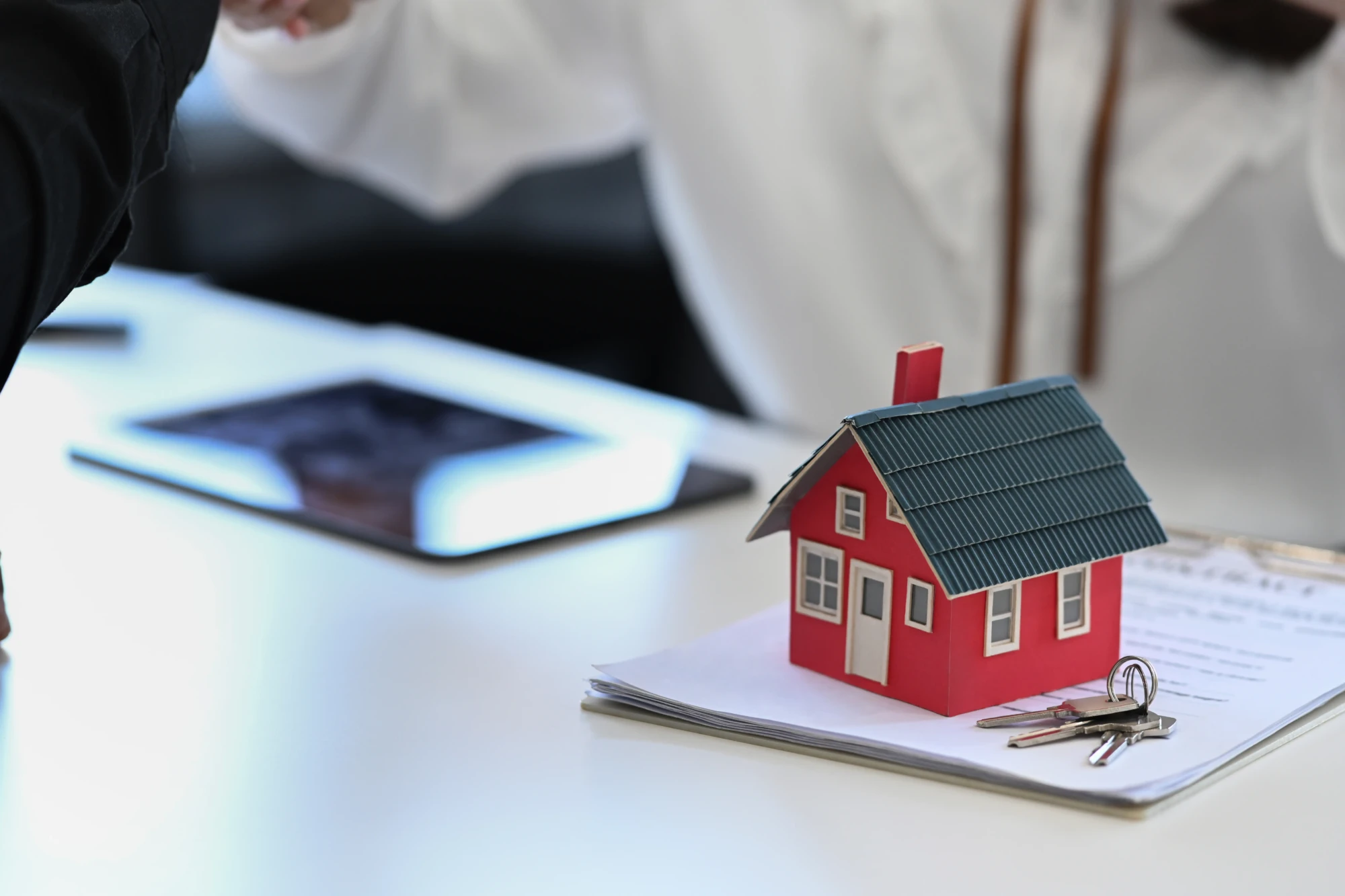 house-model-keys-and-contract-document-on-white-t-2024-12-01-17-30-53-utc